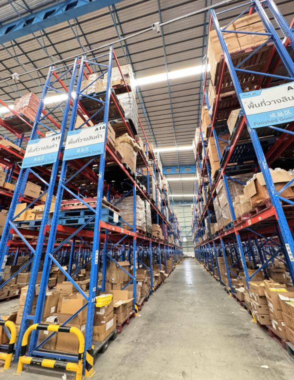 Warehouse rack aisle with storage locations
